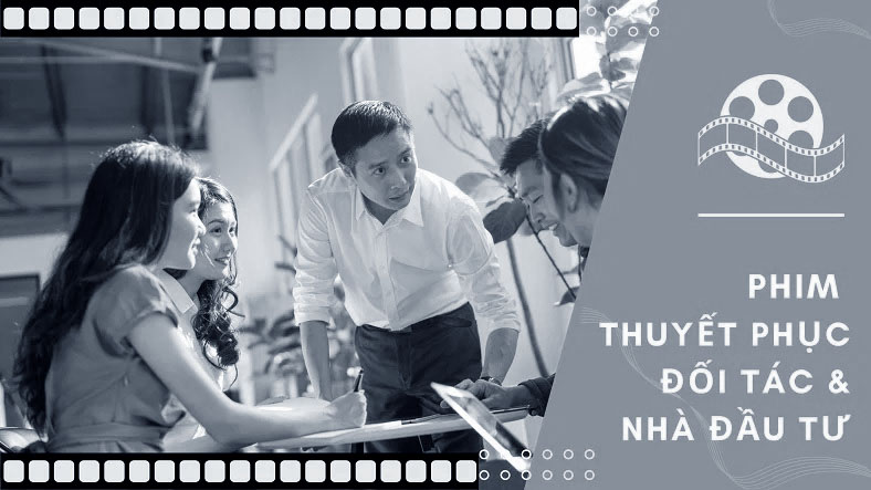 Hình ảnh một nhà lãnh đạo đang tự tin trình bày trước biểu đồ tăng trưởng trong một cảnh quay phim doanh nghiệp cho nhà đầu tư.
